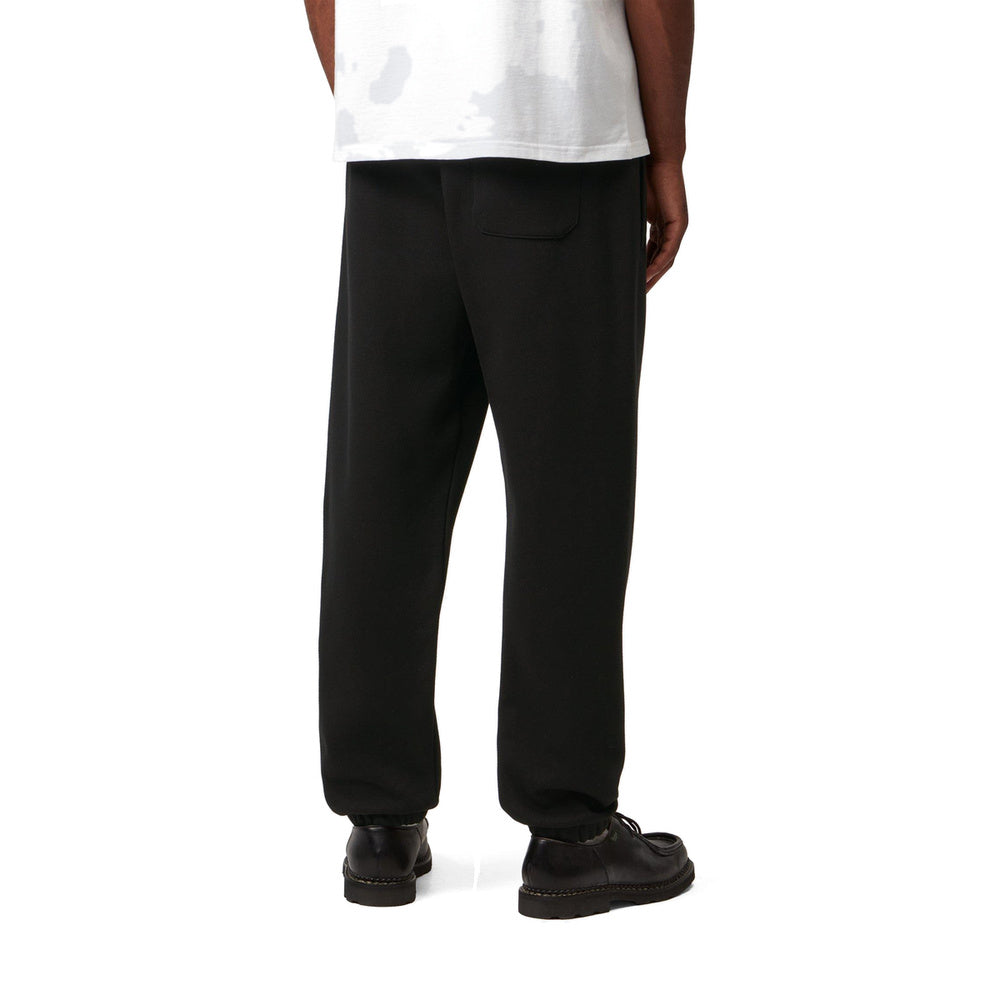 Pantaloni della tuta Carhartt WIP Chase Sweat Pant Black / Gold – indossati vista posteriore