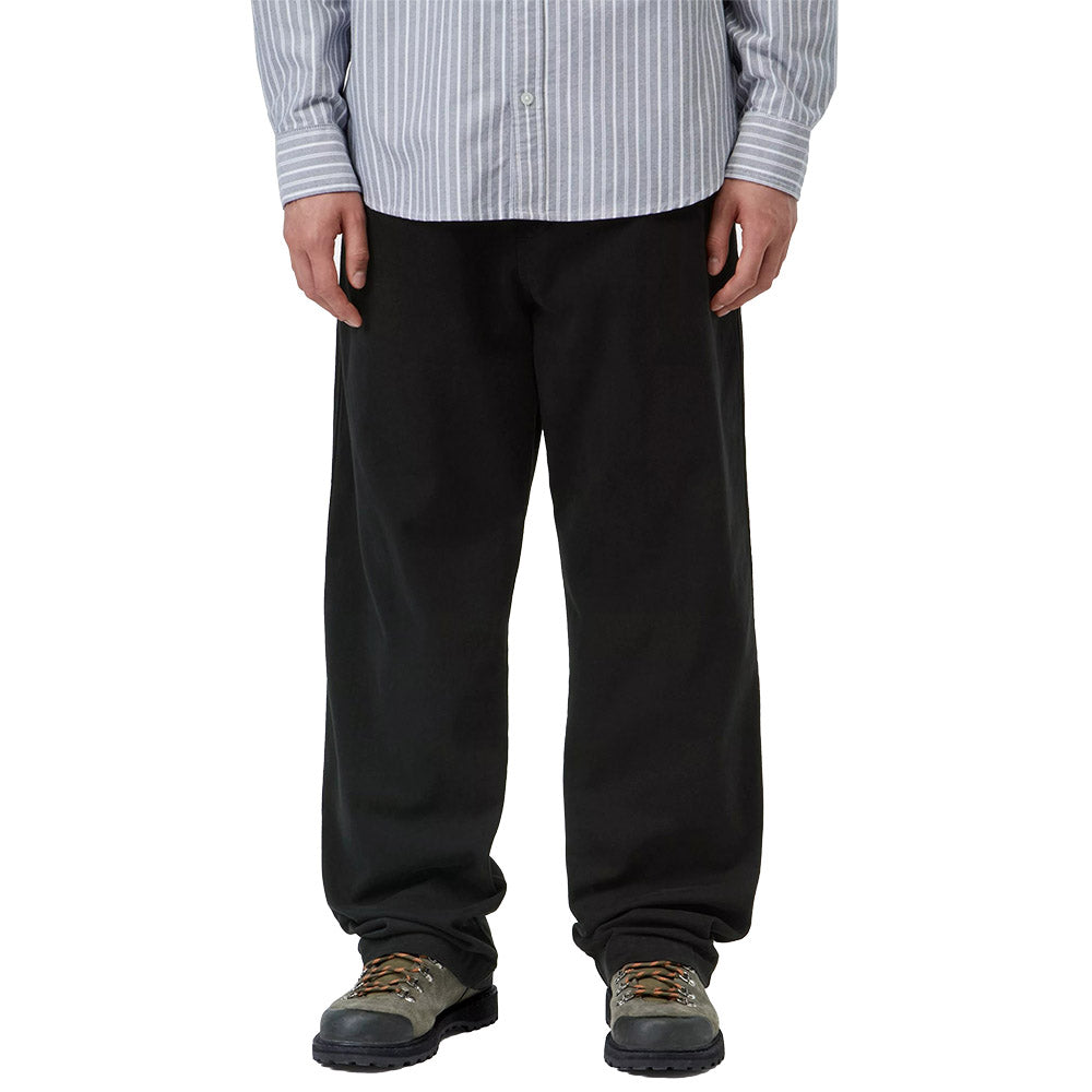 Pantaloni Carhartt WIP Floyde Pant Black / Garment Dyed – indossati vista frontale