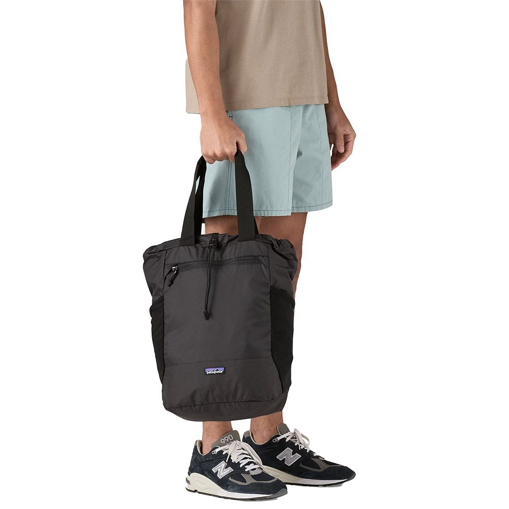 Patagonia Terravia Tote Pack 24L Black – carried by hand as a tote