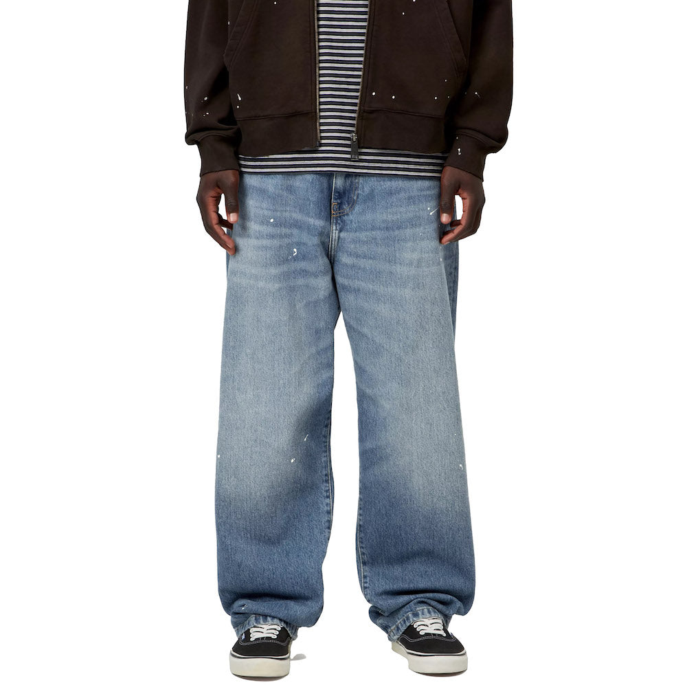Jeans Carhartt WIP Landon Pant Blue / Destroy Wash, Splatter – indossati vista frontale
