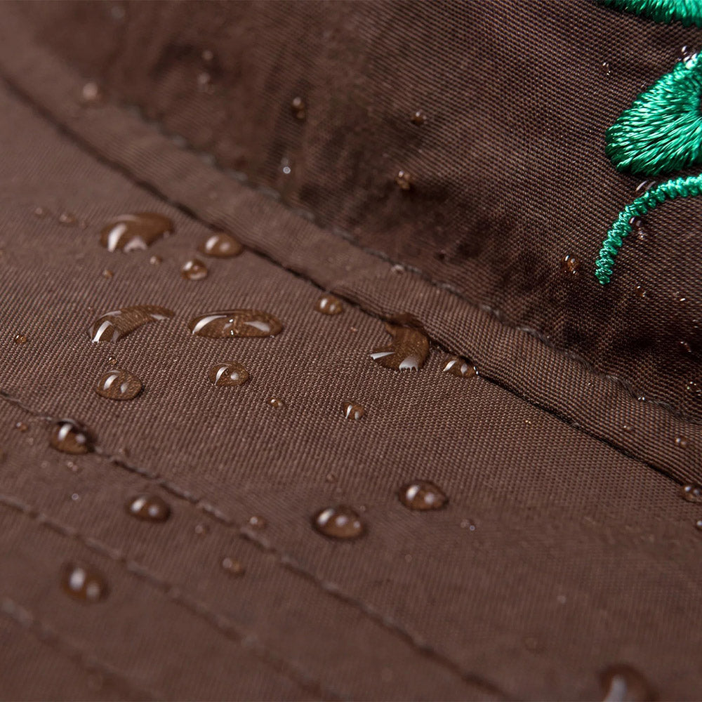 Cappellino Satisfy FliteSilk 5-Panel Pinch Cap Rain Drum – dettaglio del tessuto idrorepellente